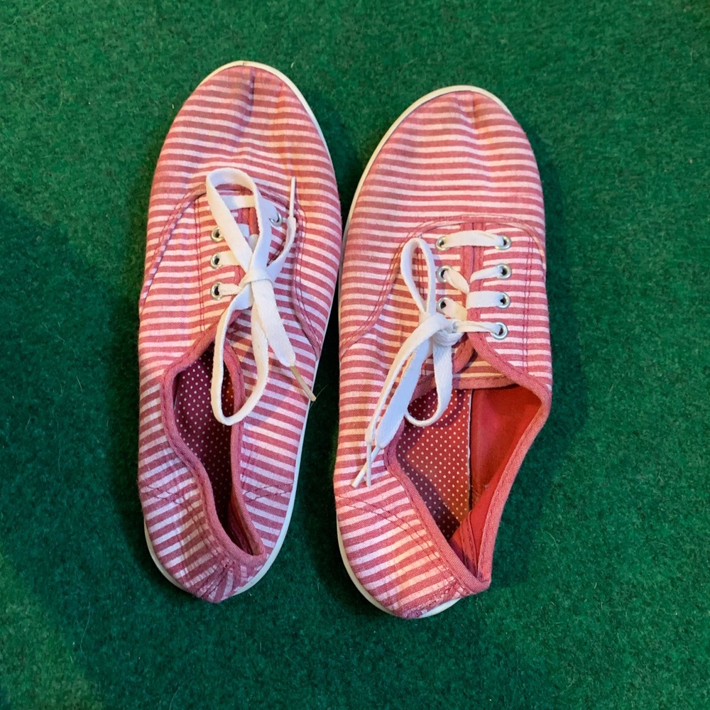 Pink and white canvas shoes
